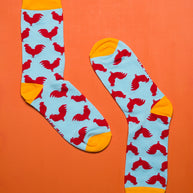 Sock It Up The Cock Sock with red rooster design on blue background