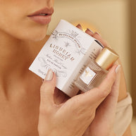 Travel-size perfume bottle with honey and blood orange notes