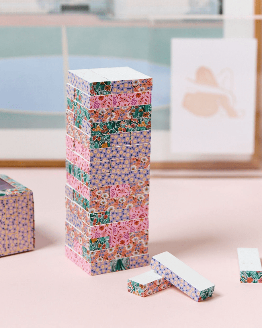 Wooden tumbling tower blocks with a floral design