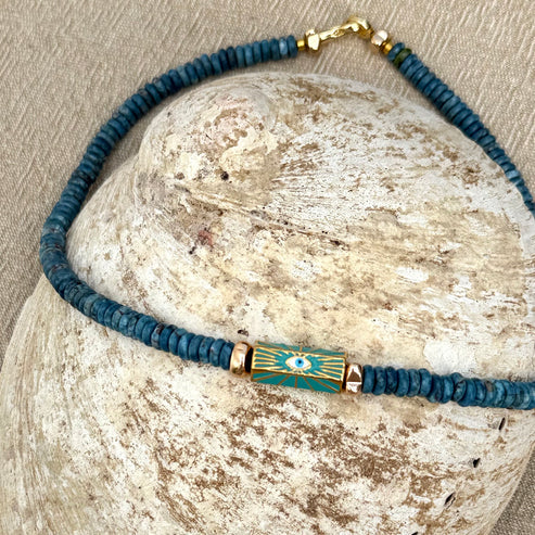 Turquoise necklace with blue enamel evil eye focal bead