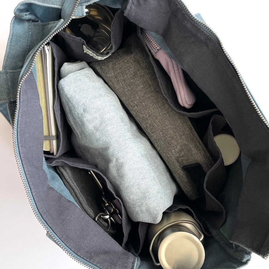 Washed blue everyday tote and nappy bag with zip top closure
