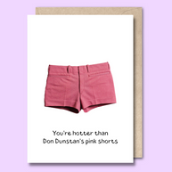 Unseasoned Greetings You’re Hotter Than Don Dunstan’s Pink Shorts card with pink shorts illustration