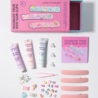 Kids craft kit contents: hair clips, clay charms, piping tips and sprinkles