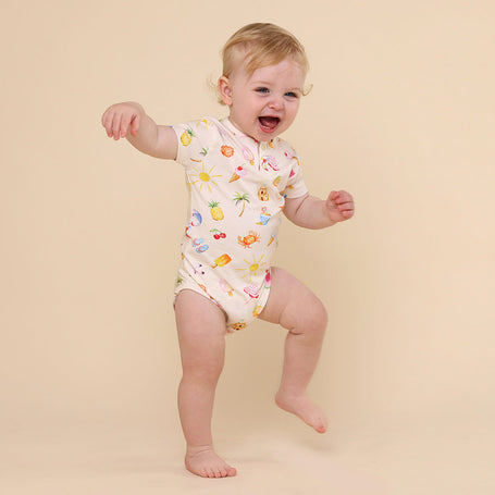 Snuggle Hunny organic baby bodysuit with hand-painted beach-themed print
