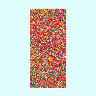 Handmade Belgian milk chocolate block topped with rainbow sprinkles
