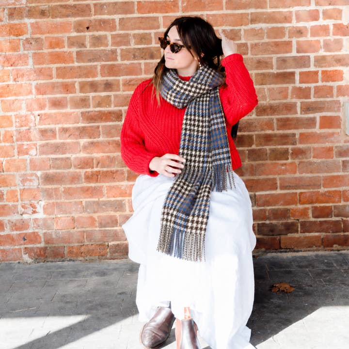 classic check scarf styled in blue and warm brown houndstooth pattern