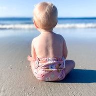 Reusable swim nappy with matching waterproof mini wet bag in Australian animals print