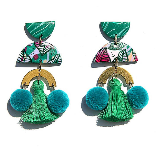 Hand-painted statement earrings with pom poms and gold accents