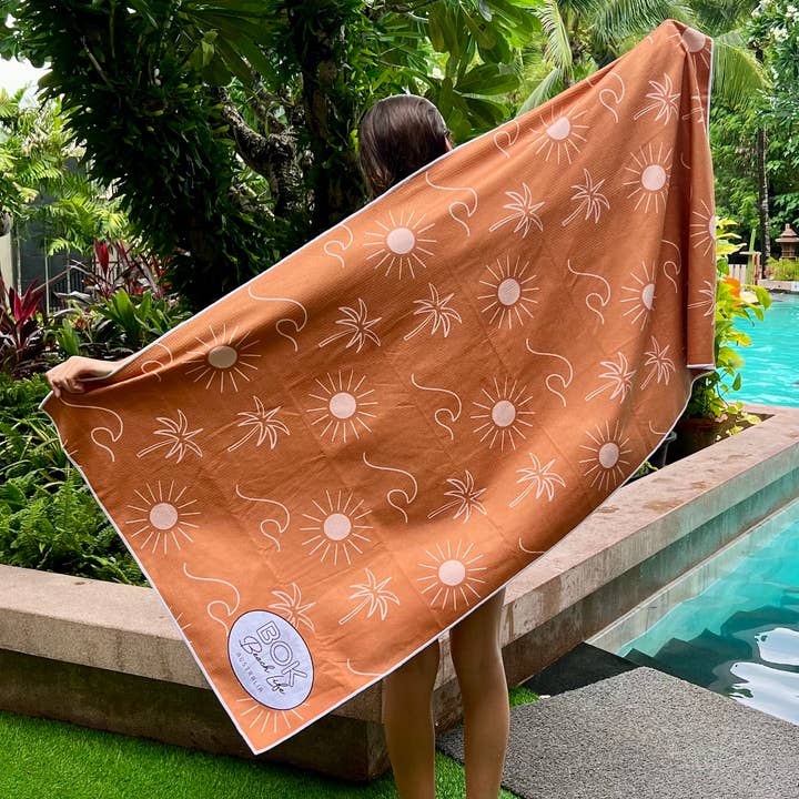 Eco-friendly quick dry beach towel with relaxed coastal design