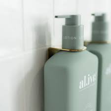 Wall-mounted holder for one al.ive body bottle