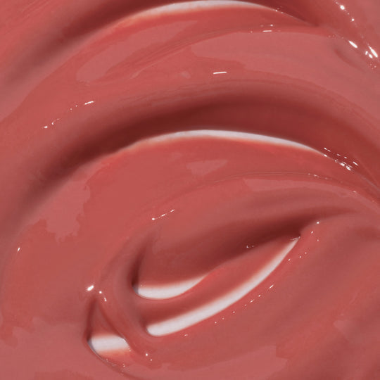 Blush-red tinted lip butter with raspberry fragrance