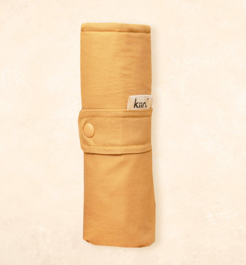 Portable waterproof change mat with soft padding by Kiin Baby