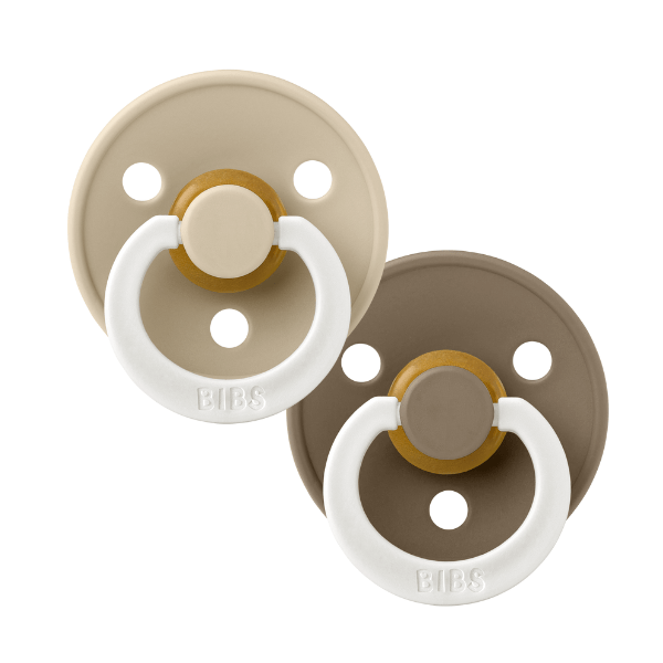 Glow in the dark baby pacifier with natural rubber latex nipple in warm neutral tones