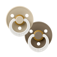 Glow in the dark baby pacifier with natural rubber latex nipple in warm neutral tones